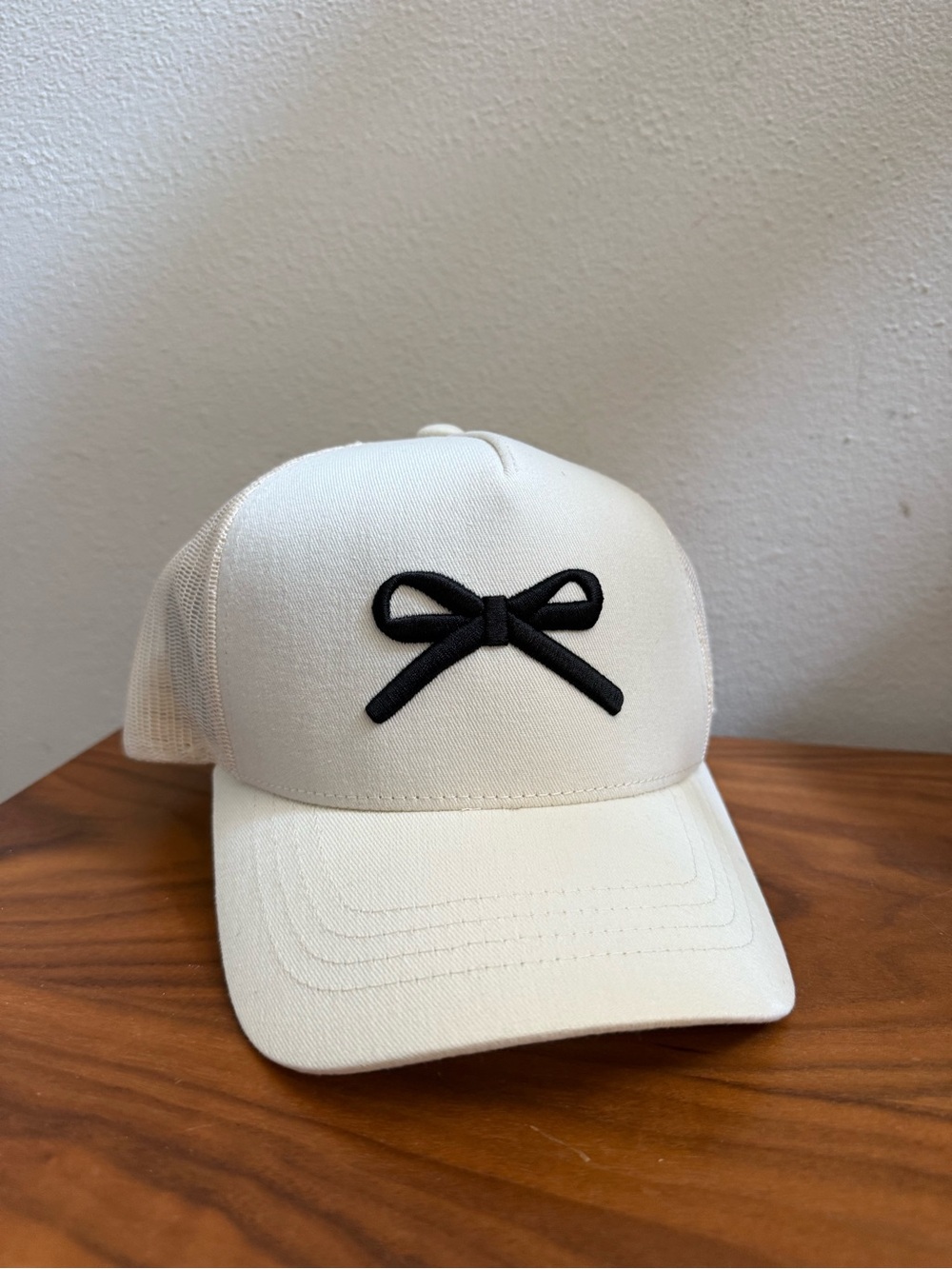 Little Bipsy Cream Trucker Hat with Black Bow